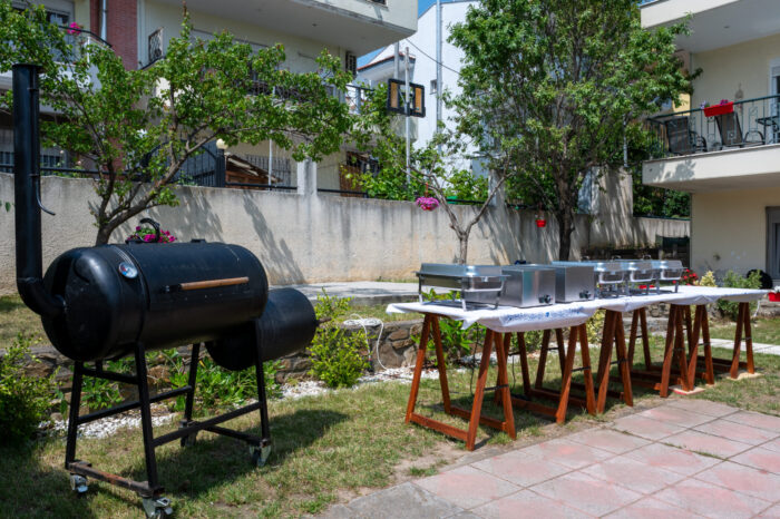 Texas smoked BBQ smoker grill and buffet chafing dishes ready for catering