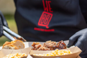 BBQ plate with smoked pulled pork, mac and cheese, coleslaw and bread at catering